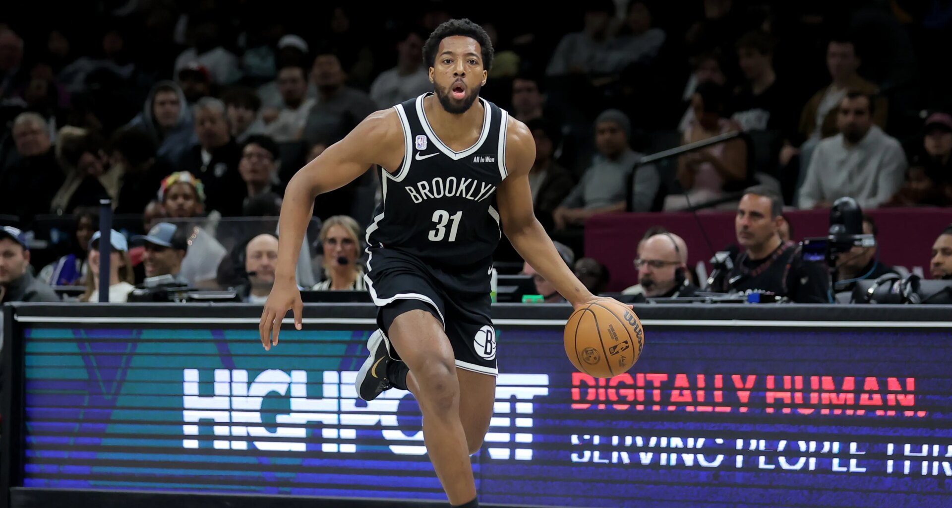 Former Auburn star Chaney Johnson re-signs with the Brooklyn Nets