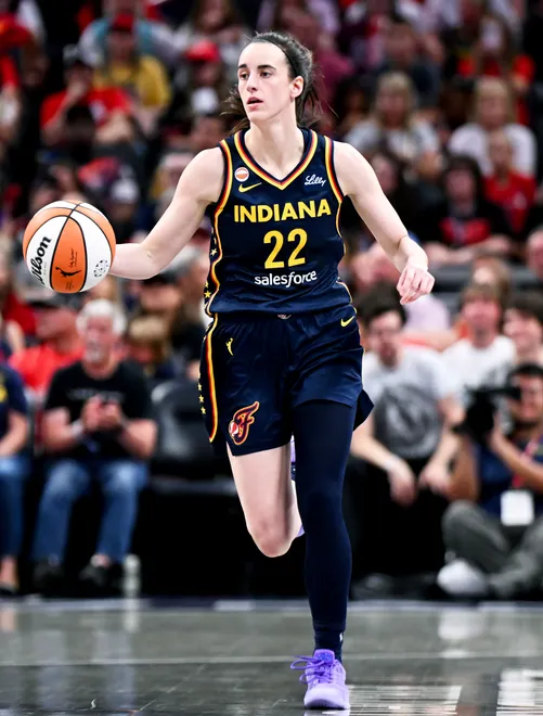 INDIANAPOLIS, INDIANA - JULY 18: Caitlin Clark #22 of the Indiana Fever dribbles against the New York Liberty during the first half at Gainbridge Fieldhouse on July 18, 2026, in Indianapolis, Indiana. NOTE TO USER: User expressly acknowledges and agrees that, by downloading and or using this photograph, User is consenting to the terms and conditions of the Getty Images License Agreement. (Photo by Bobby Goddin/Getty Images)