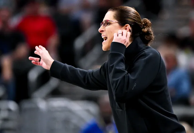 INDIANAPOLIS, INDIANA - JULY 18: Head coach Stephanie White of the Indiana Fever directs a play from the sideline during the first half against the Indiana Fever at Gainbridge Fieldhouse on July 18, 2026, in Indianapolis, Indiana. NOTE TO USER: User expressly acknowledges and agrees that, by downloading and or using this photograph, User is consenting to the terms and conditions of the Getty Images License Agreement. (Photo by Bobby Goddin/Getty Images)