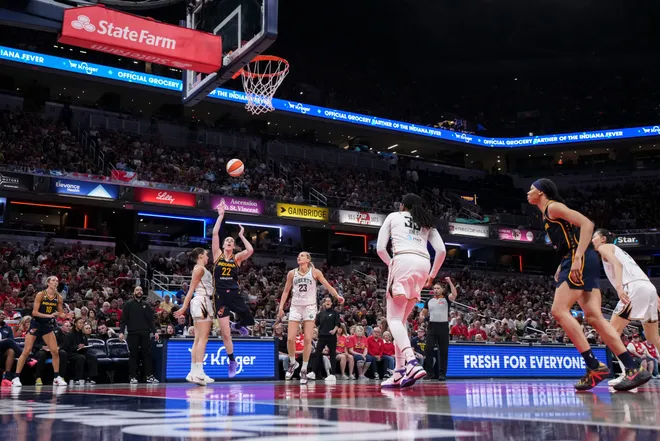 Indiana Fever guard Caitlin Clark (22) goes up for a basket during the second half of a game at Gainbridge Fieldhouse in Indianapolis on Saturday, July 18, 2026.