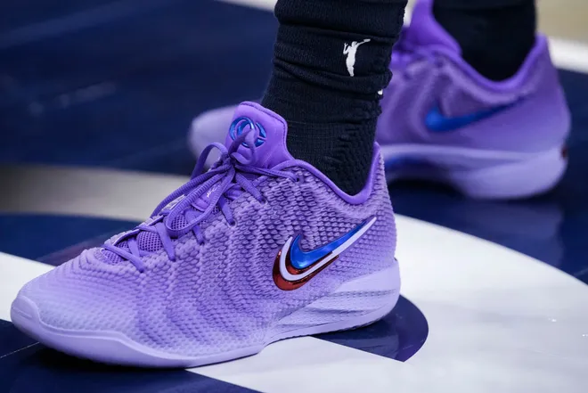 Indiana Fever guard Caitlin Clark (22) wears a purple pair of the Nike Signature "Caitlin 1" shoes before a game at Gainbridge Fieldhouse in Indianapolis on Saturday, July 18, 2026.