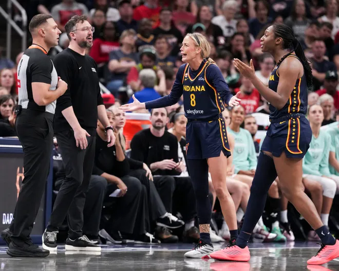 Indiana Fever guard Sophie Cunningham (8) and Indiana Fever center Aliyah Boston (7) react to a foul call during the second half of a game at Gainbridge Fieldhouse in Indianapolis on Saturday, July 18, 2026.
