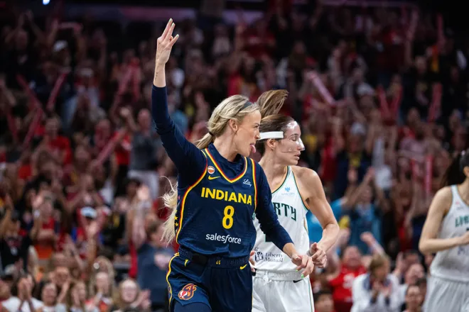 Jul 18, 2026; Indianapolis, Indiana, USA; Indiana Fever guard Sophie Cunningham (8) celebrates a made basket in the second half against the New York Liberty at Gainbridge Fieldhouse. Mandatory Credit: Trevor Ruszkowski-Imagn Images