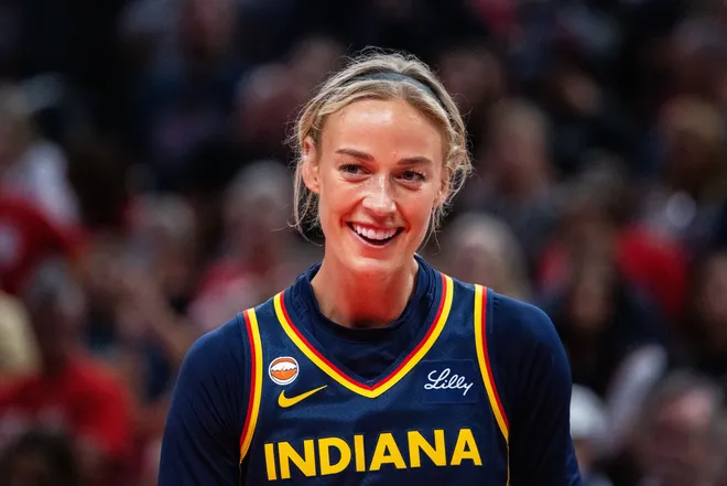 Jul 18, 2026; Indianapolis, Indiana, USA; Indiana Fever guard Sophie Cunningham (8) smiles in the second half against the New York Liberty at Gainbridge Fieldhouse. Mandatory Credit: Trevor Ruszkowski-Imagn Images