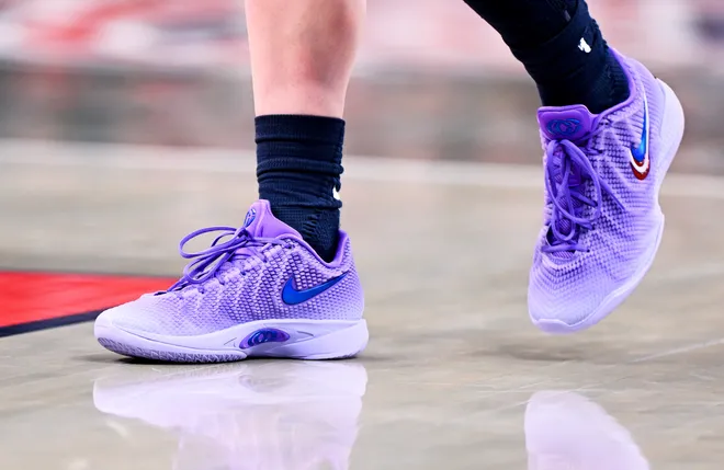 INDIANAPOLIS, INDIANA - JULY 18: A detail view of Indiana Fever guard Caitlin Clark's purple Nike Signature "Caitlin 1" shoes against the New York Liberty during the second half at Gainbridge Fieldhouse on July 18, 2026, in Indianapolis, Indiana. NOTE TO USER: User expressly acknowledges and agrees that, by downloading and or using this photograph, User is consenting to the terms and conditions of the Getty Images License Agreement. (Photo by Bobby Goddin/Getty Images)