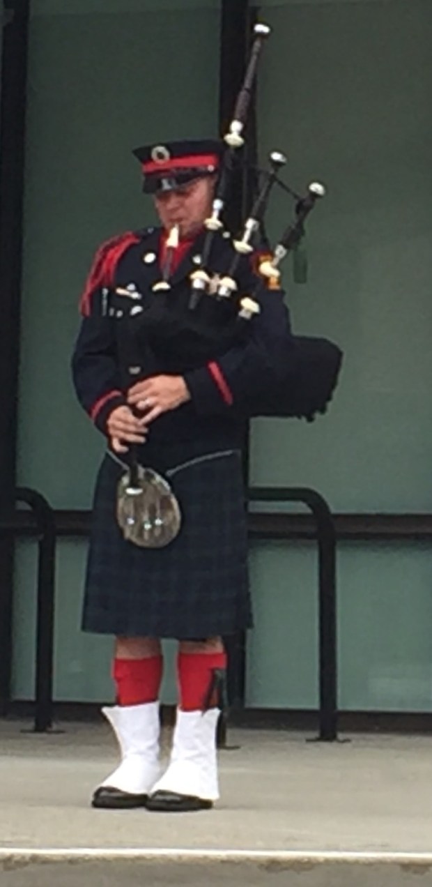 Vallejo firefighter Walter Trujillo plays Amazing Grace on bagpipes during a 9/11 ceremony on Sunday morning. (Thomas Gase -Times-Herald)