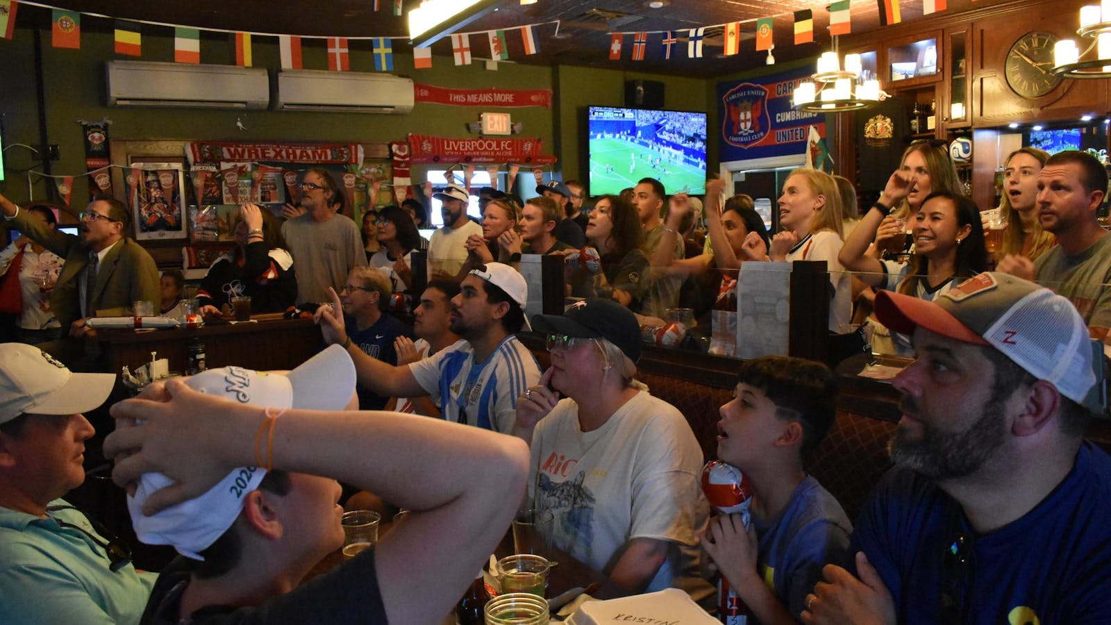 A slice of England: The Queen’s Arms Pub embraces World Cup frenzy