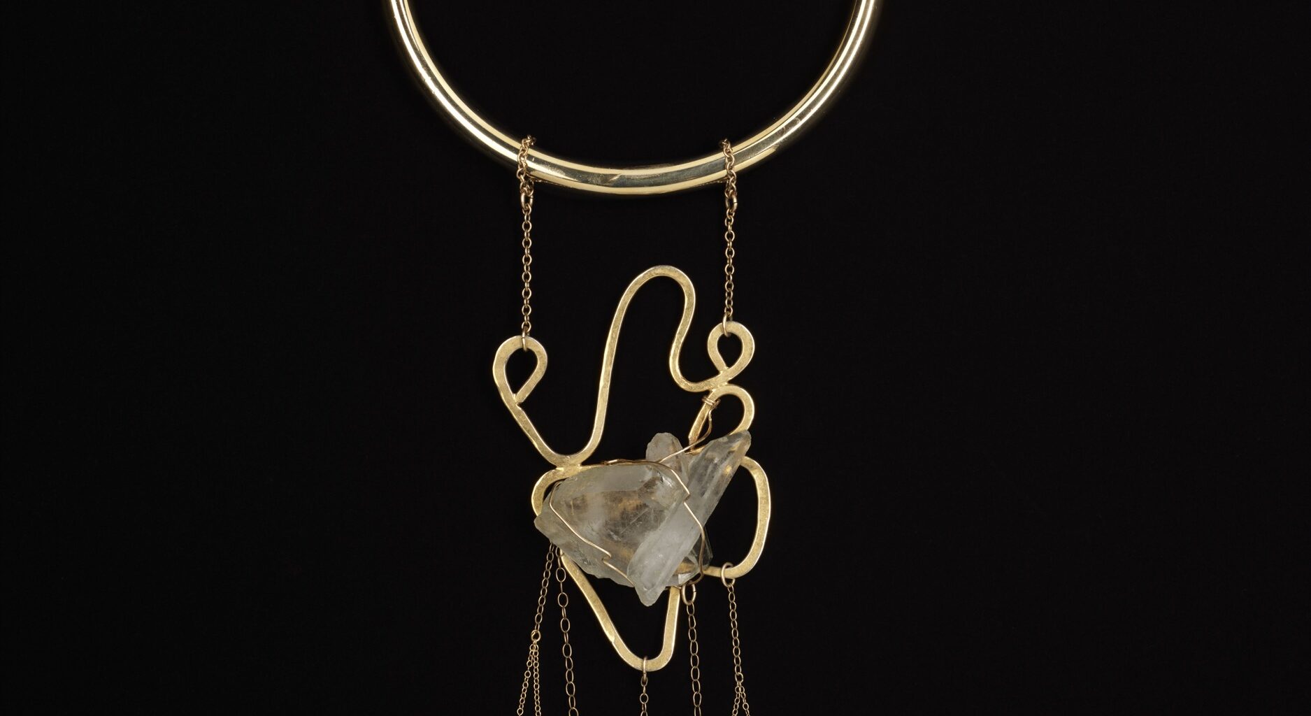 Douriean Fletcher, Necklace from the "Messengers" collection [M3], 2016 (re-created 2025). Gold-plated brass, gold-plated copper, gold-filled chain, gold-filled wire, and quartz. Courtesy the artist.