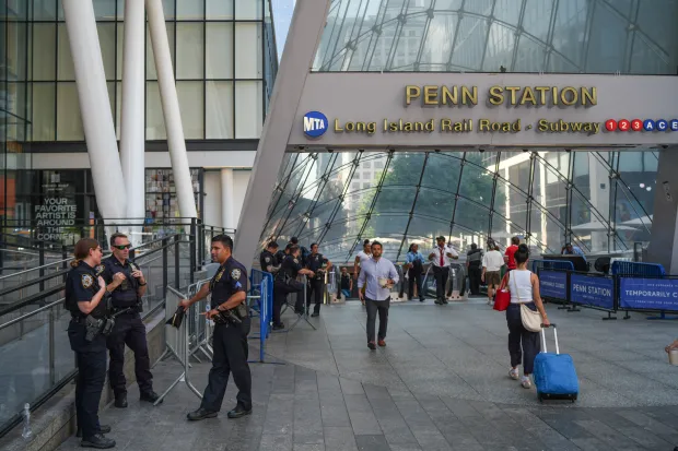 NYPD officers stand by outside of Madison Square Garden ahead of a reported wedding between singer Taylor Swift and National Football League player Travis Kelce on Thursday, July 2, 2026, in New York. (AP Photo/Ryan Murphy)