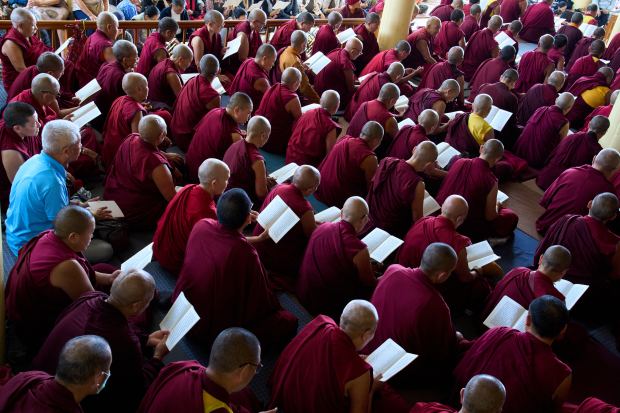 Exiled Tibetan Buddhists pray for Lobga Rangzen (Lobsang Palden), who died after setting himself on fire in front of the United Nations headquarters in New York on Thursday, at the Tsuglakhang temple in Dharamshala, India, Saturday, July 4, 2026. (AP Photo/Ashwini Bhatia)