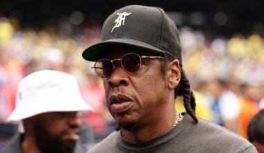 Jay-Z looks on ahead of the start the World Cup round of 16 soccer match between Brazil and Norway in East Rutherford, N.J., near New York, Sunday, July 5, 2026.