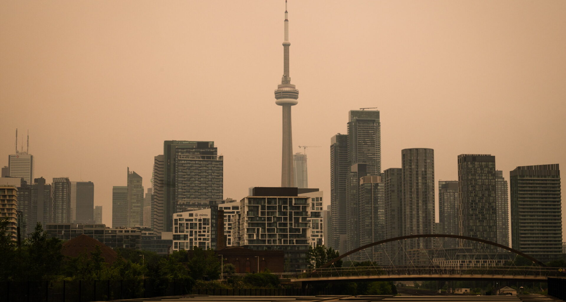 The CN Tower is pictured in Toronto as wildfire smoke fills the city, on Wednesday, July 15, 2026. Photo: Laura Proctor/The Canadian Press via AP