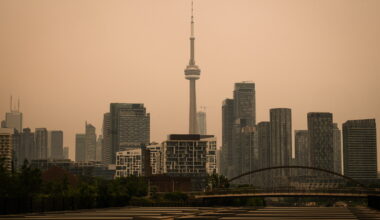The CN Tower is pictured in Toronto as wildfire smoke fills the city, on Wednesday, July 15, 2026. Photo: Laura Proctor/The Canadian Press via AP