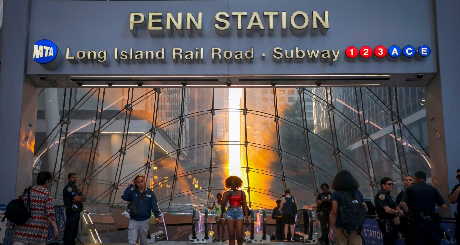 Commuters pass Penn Station and Madison Square Garden, July 2, 2026, in New York. Photo: Andy Kropa/Invision/AP, File