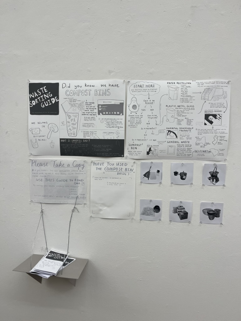 A bulletin board mounted on a white wall displays various informative posters about waste sorting and composting. The guides include topics like compost bins, recycling processes, and harmful household products. A box hangs below the board with copies of the waste sorting guide for people to take. Several photographs of compostable items are arranged on the right side, alongside a prompt asking if users have utilized the compost bin before.