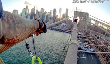 VIDEO: Cops Rescue Suicidal Woman Perched on Brooklyn Bridge Beam