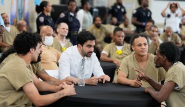 New York City Mayor Zohran Mamdani speaks with Rikers Island inmates as they watch the World Cup semifinal soccer match between England and Argentina, at the jail complex in New York.