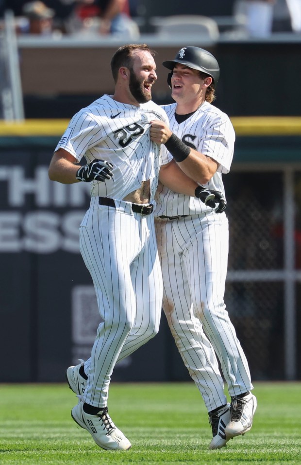 Chicago White Sox center fielder Tristan Peters, left, celebrates with Sam Antonacci after taking a walk-off walk to defeat the New York Yankees 2-1 in 11 innings Thursday, July 30, 2026, at Rate Field. (Brian Cassella/Chicago Tribune)
