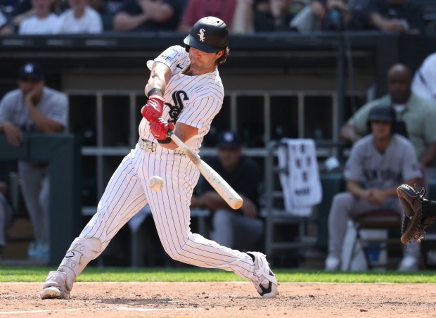 Chicago White Sox pinch hitter Andrew Benintendi ties the game with a base hit against the New York Yankees in the eleventh inning Thursday, July 30, 2026, at Rate Field. (Brian Cassella/Chicago Tribune)