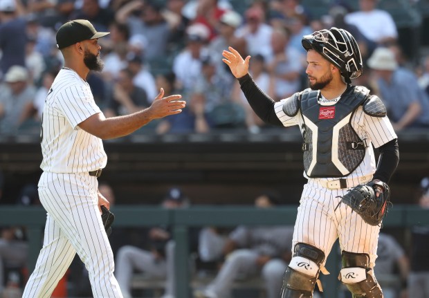 Chicago White Sox pitcher Seranthony Domínguez and catcher Edgar Quero celebrate finishing the top of the eleventh inning against the New York Yankees on Thursday, July 30, 2026, at Rate Field. (Brian Cassella/Chicago Tribune)