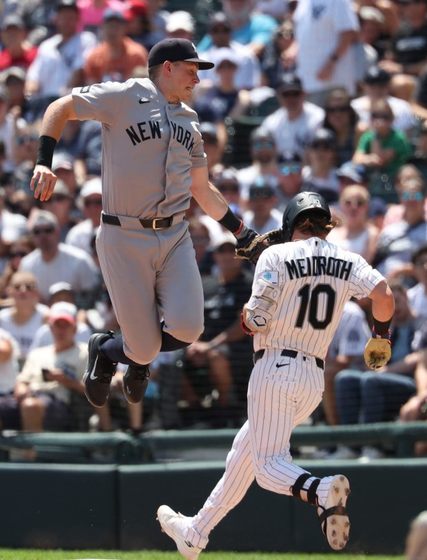 New York Yankees first baseman Ben Rice tags out Chicago White Sox second baseman Chase Meidroth in the first inning Thursday, July 30, 2026, at Rate Field. (Brian Cassella/Chicago Tribune)