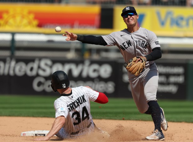 New York Yankees shortstop Anthony Volpe forces out Chicago White Sox left fielder Randal Grichuk (34) at second base to end the sixth inning Thursday, July 30, 2026, at Rate Field. (Brian Cassella/Chicago Tribune)