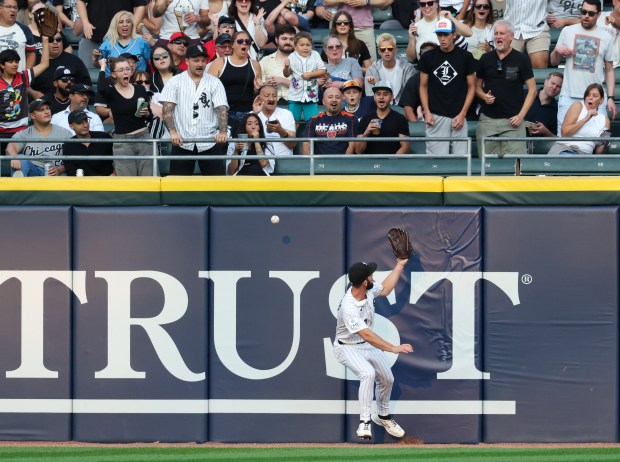 White Sox center fielder Tristan Peters is unable to grab a ball hit for an RBI double by Yankees shortstop Anthony Volpe in the second inning at Rate Field on July 28, 2026, in Chicago. (John J. Kim/Chicago Tribune)