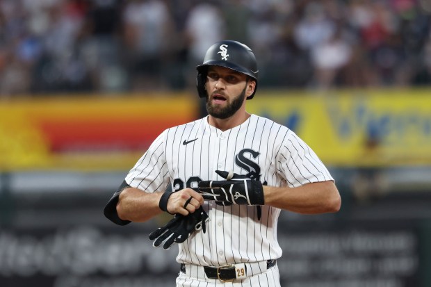White Sox center fielder Tristan Peters takes off his batting gloves after flying out with the bases loaded to end the fourth inning against the Yankees at Rate Field on July 28, 2026, in Chicago. (John J. Kim/Chicago Tribune)