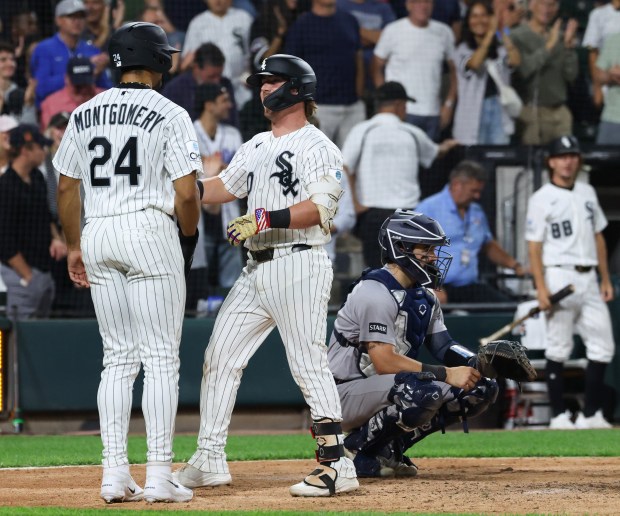 White Sox second baseman Chase Meidroth, center, celebrates after hitting a two-run home run in the ninth inning against the Yankees at Rate Field on July 28, 2026, in Chicago. (John J. Kim/Chicago Tribune)