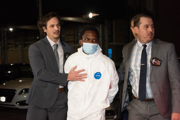 Vincent Pinkney is led from the NYPD 26th Precinct station house in Manhattan, New York City on Friday, December 3, 2021. (Gardiner Anderson for New York Daily News)