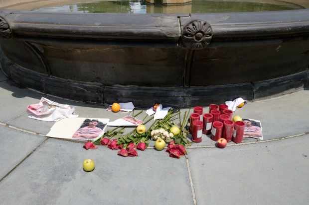 A makeshift memorial to 18-year-old Romanch Mahajan sits at the southern edge of Cherry Hill fountain. Mahajan was killed while trying to help his mother, who was thrown from the carriage of a bolting horse last month. (Evan Simko-Bednarski/New York Daily News)
