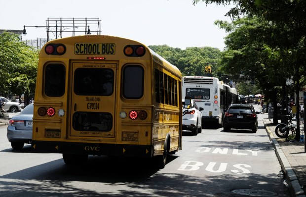 A vehicle blocks the faded bus lane along Fordham Rd. in the Bronx on July 11, 2023. (Evan Simko-Bednarski / New York Daily News)