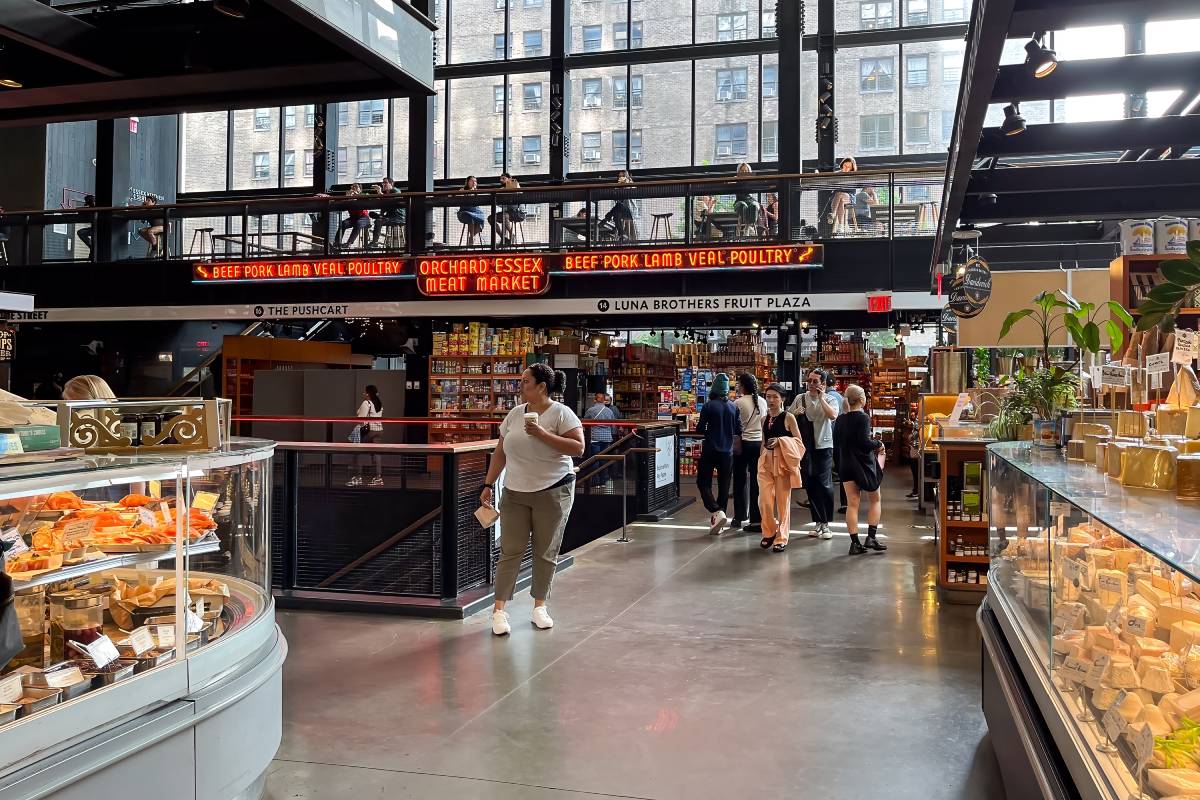 Dating back to 1818: This historic Manhattan market features immigrant roots, ornate architecture, vintage vendor stalls, and over 200 years of culinary history