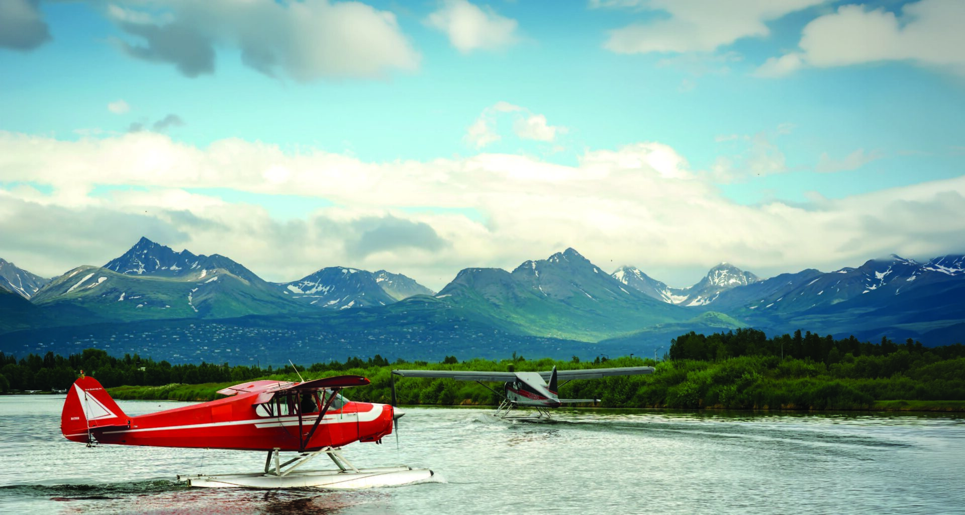 Lake Hood Seaplane Base in Alaska is both the largest and busiest facility of its kind in the world. [Credit: Adobe Stock]