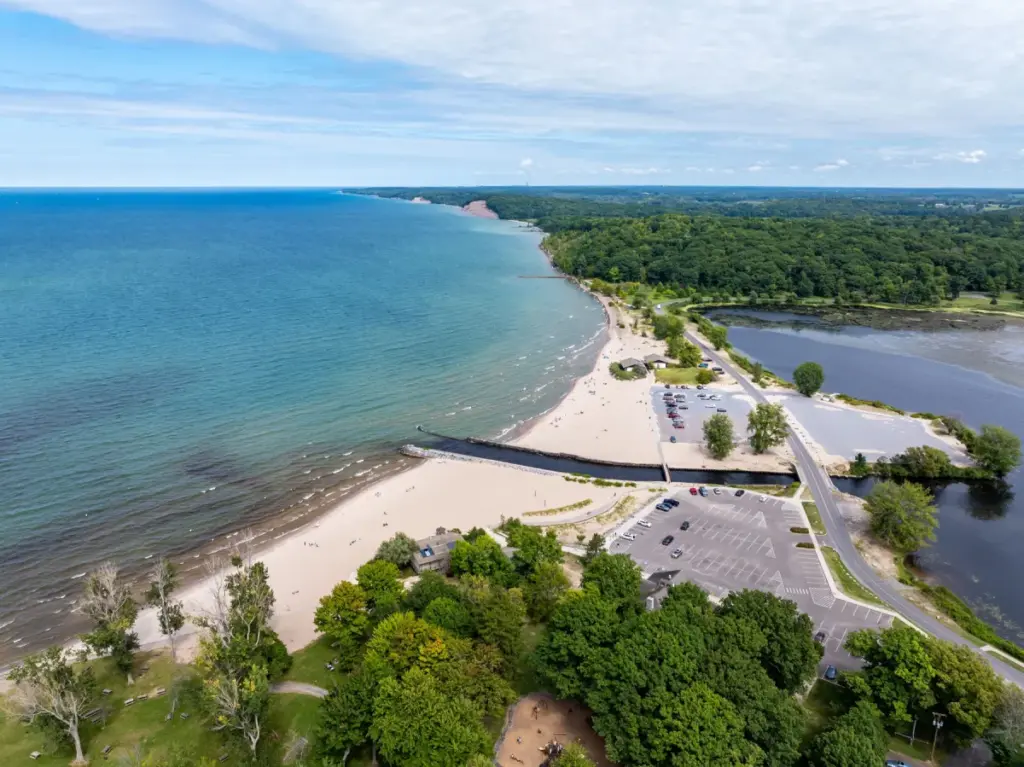 One of New York’s largest freshwater beaches is tucked along Lake Ontario—with sandy shores, waterfront camping & unforgettable sunsets