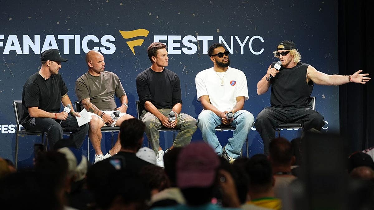 Tom Brady, Karl-Anthony Towns and Logan Paul speak onstage at Fanatics Fest NYC.