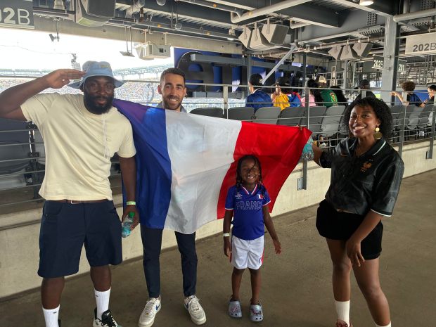 Ingrid Cabrae (right) was among the France supporters who watched a 3-0 win over Sweden on June 30. (Photo by Peter Sblendorio)