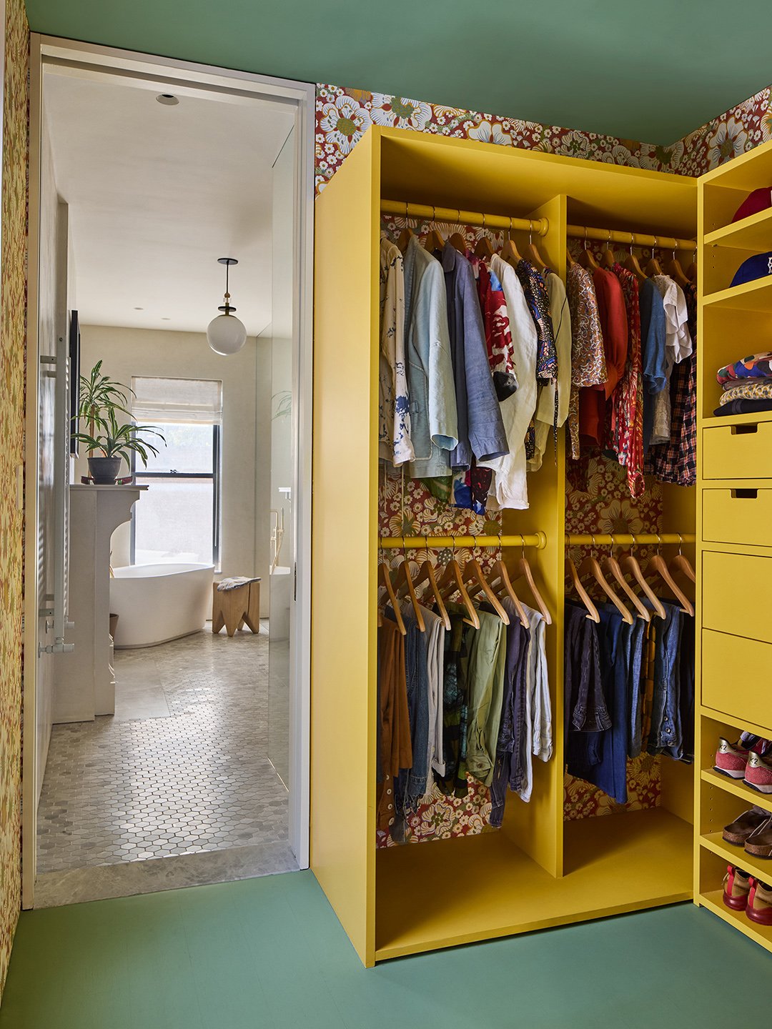 closet with yellow shelving