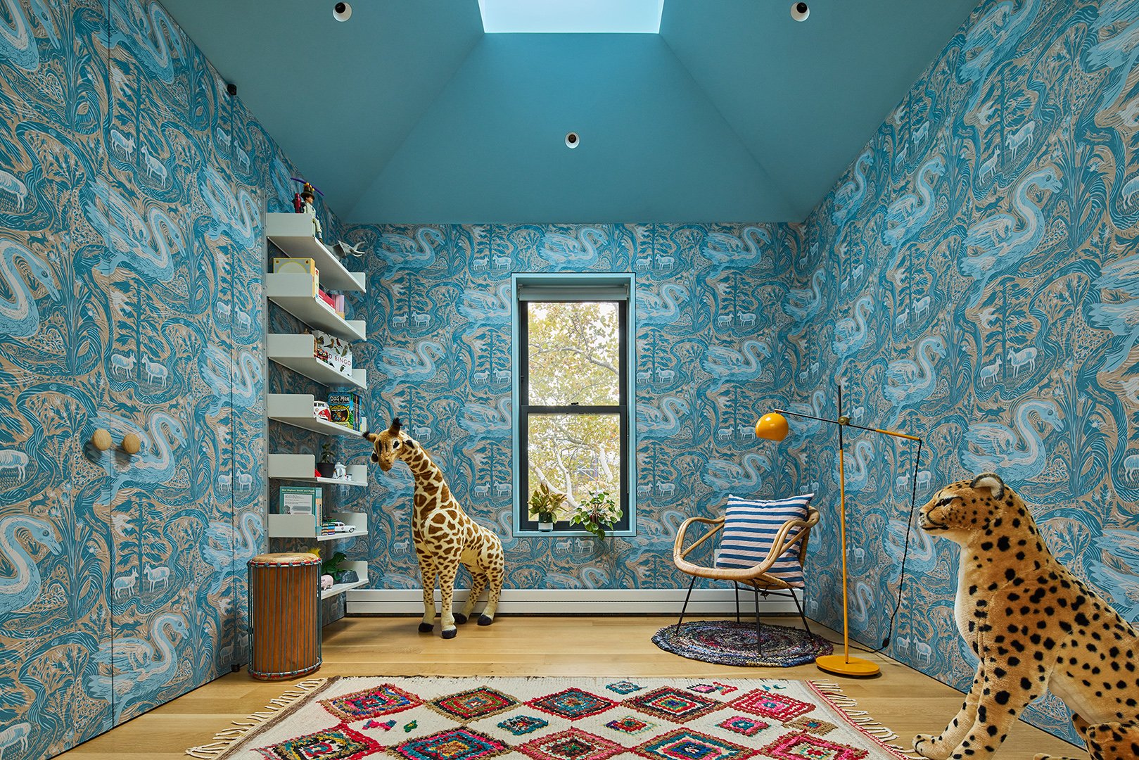 blue wallpapered kids playroom