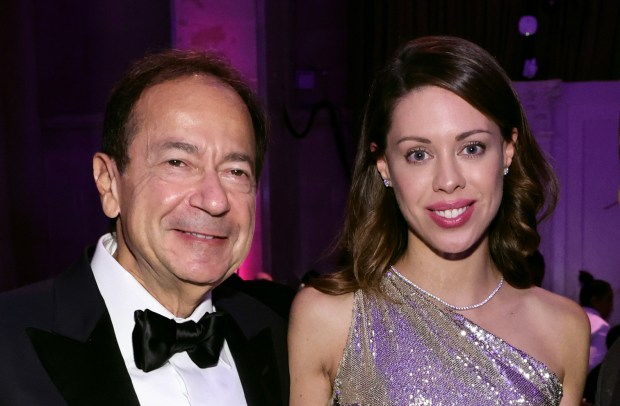 John Paulson and Alina de Almeida attend Angel Ball 2022 hosted by Gabrielle's Angel Foundation at Cipriani Wall Street on Oct. 24, 2022 in New York City. (Photo by Jamie McCarthy/Getty Images)