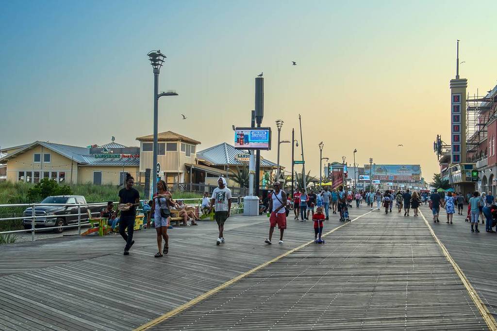 ATLANTIC CITY, NEW JERSEY - JULY 18: A crowded boardwalk on July 18, 2023 in Atlantic City, New Jersey.