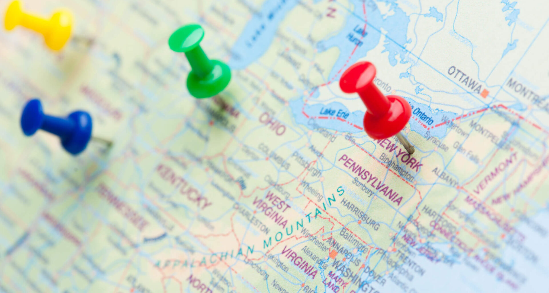 Pushpin road map showing a destination of New York