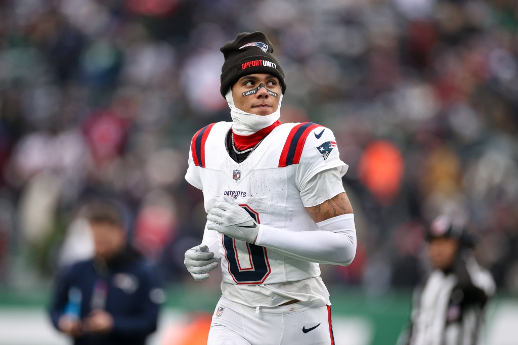 Christian Gonzalez #0 of the New England Patriots looks on during the game against the New York Jets at MetLife Stadium on December 28, 2025 in East Rutherford, New Jersey.