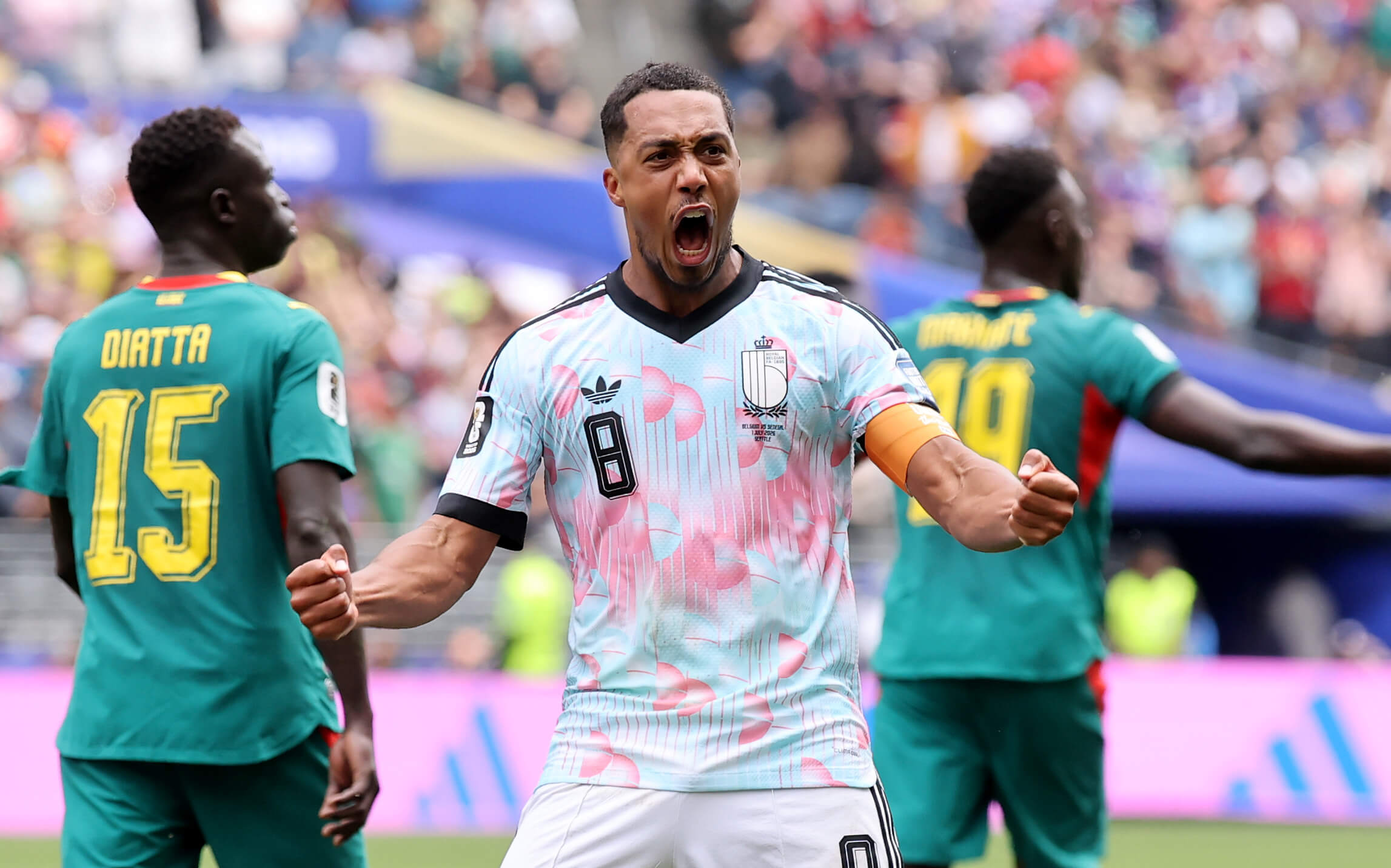 Youri Tielemans celebrates his equaliser against Senegal