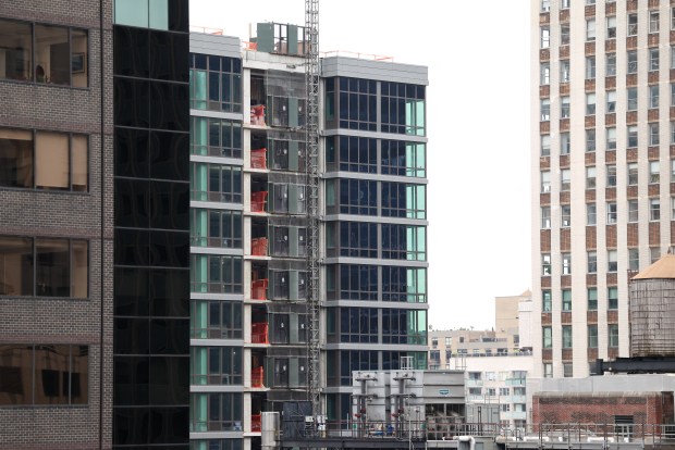 A building has been evacuated in the Manhattan borough of New York City on July 7, 2026. Emergency services evacuated a busy Manhattan street block during the Tuesday morning rush hour after structural columns buckled inside a skyscraper undergoing construction work, according to firefighters. (Photo by CHARLY TRIBALLEAU / AFP via Getty Images)