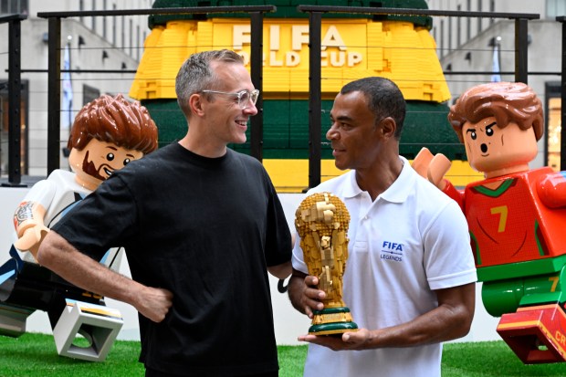 NEW YORK, NEW YORK - JULY 06: Football legend Cafu joins fans as the LEGO Group unveils the world's biggest FIFA World Cup Trophy™ in New York City on July 06, 2026 in New York, New York. (Photo by Eugene Gologursky/Getty Images for LEGO Group)