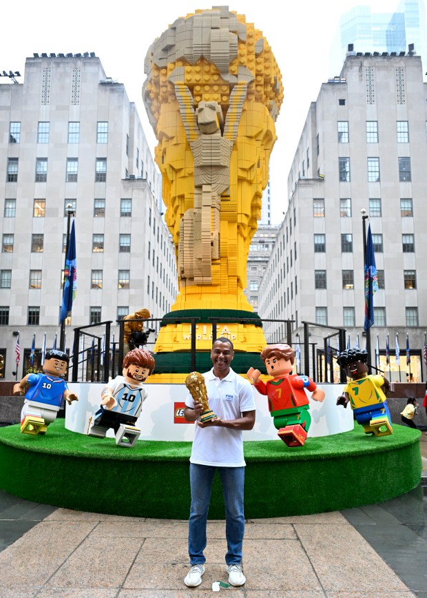 NEW YORK, NEW YORK - JULY 06: Football legend Cafu joins fans as the LEGO Group unveils the world's biggest FIFA World Cup Trophy™ in New York City on July 06, 2026 in New York, New York. (Photo by Eugene Gologursky/Getty Images for LEGO Group)