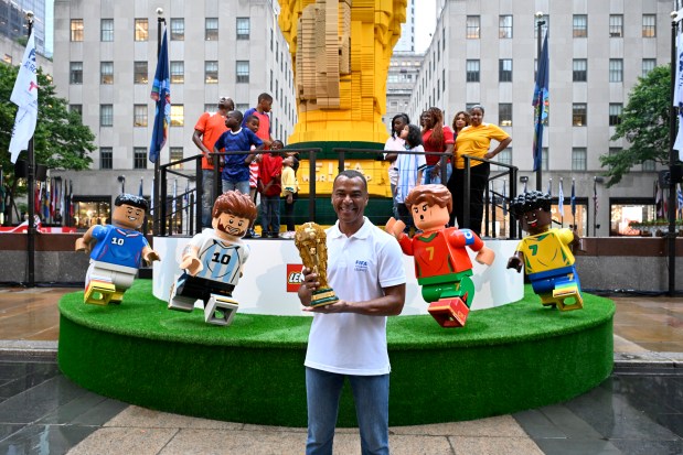 NEW YORK, NEW YORK - JULY 06: Football legend Cafu joins fans as the LEGO Group unveils the world's biggest FIFA World Cup Trophy™ in New York City on July 06, 2026 in New York, New York. (Photo by Eugene Gologursky/Getty Images for LEGO Group)