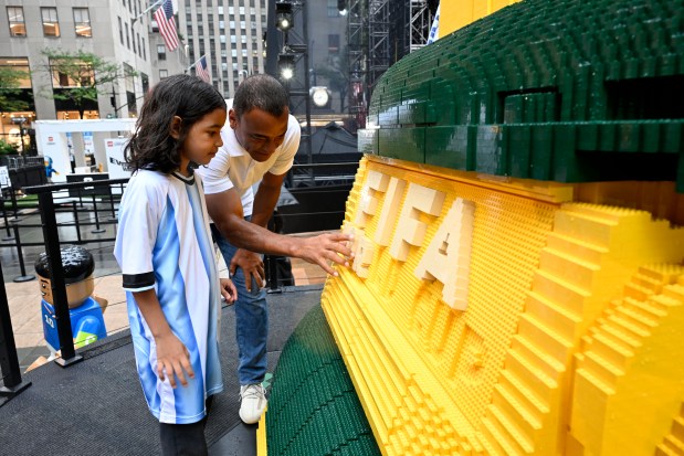 NEW YORK, NEW YORK - JULY 06: Football legend Cafu joins fans as the LEGO Group unveils the world's biggest FIFA World Cup Trophy™ in New York City on July 06, 2026 in New York, New York. (Photo by Eugene Gologursky/Getty Images for LEGO Group)