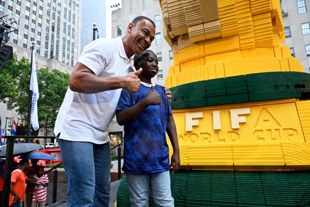 NEW YORK, NEW YORK - JULY 06: Football legend Cafu joins fans as the LEGO Group unveils the world's biggest FIFA World Cup Trophy™ in New York City on July 06, 2026 in New York, New York. (Photo by Eugene Gologursky/Getty Images for LEGO Group)